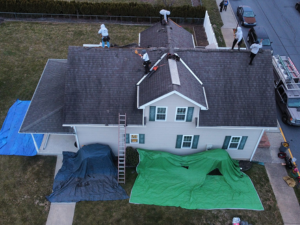 The Gassert Roofing team repairing roof damage after a summer storm in Palmyra, PA.