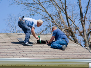 Professional roof repair work in progress in Manheim